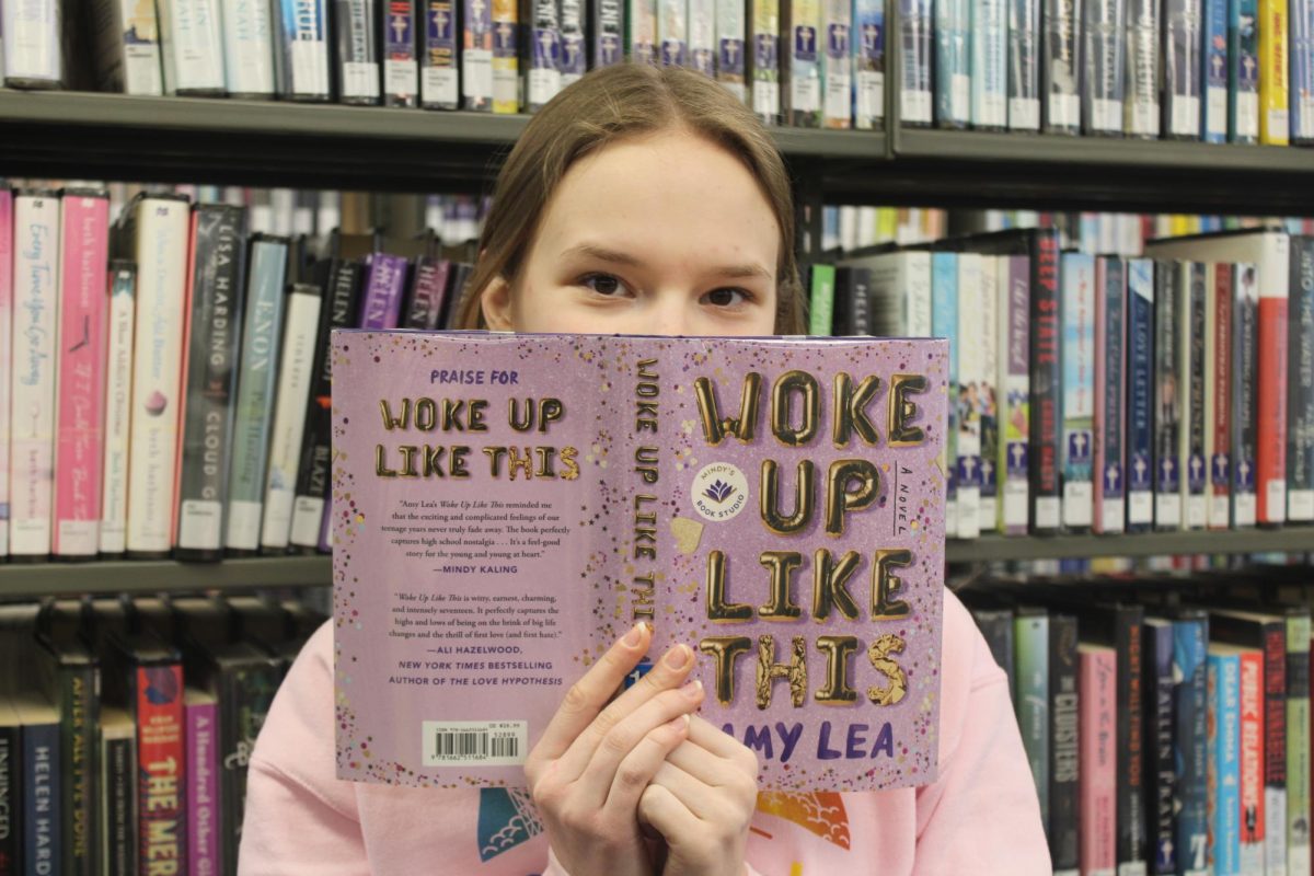 Jojo and the featured book of the week Woke up like This