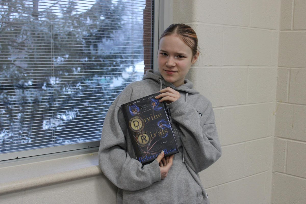 Jojo looking hateful with the book of the week.