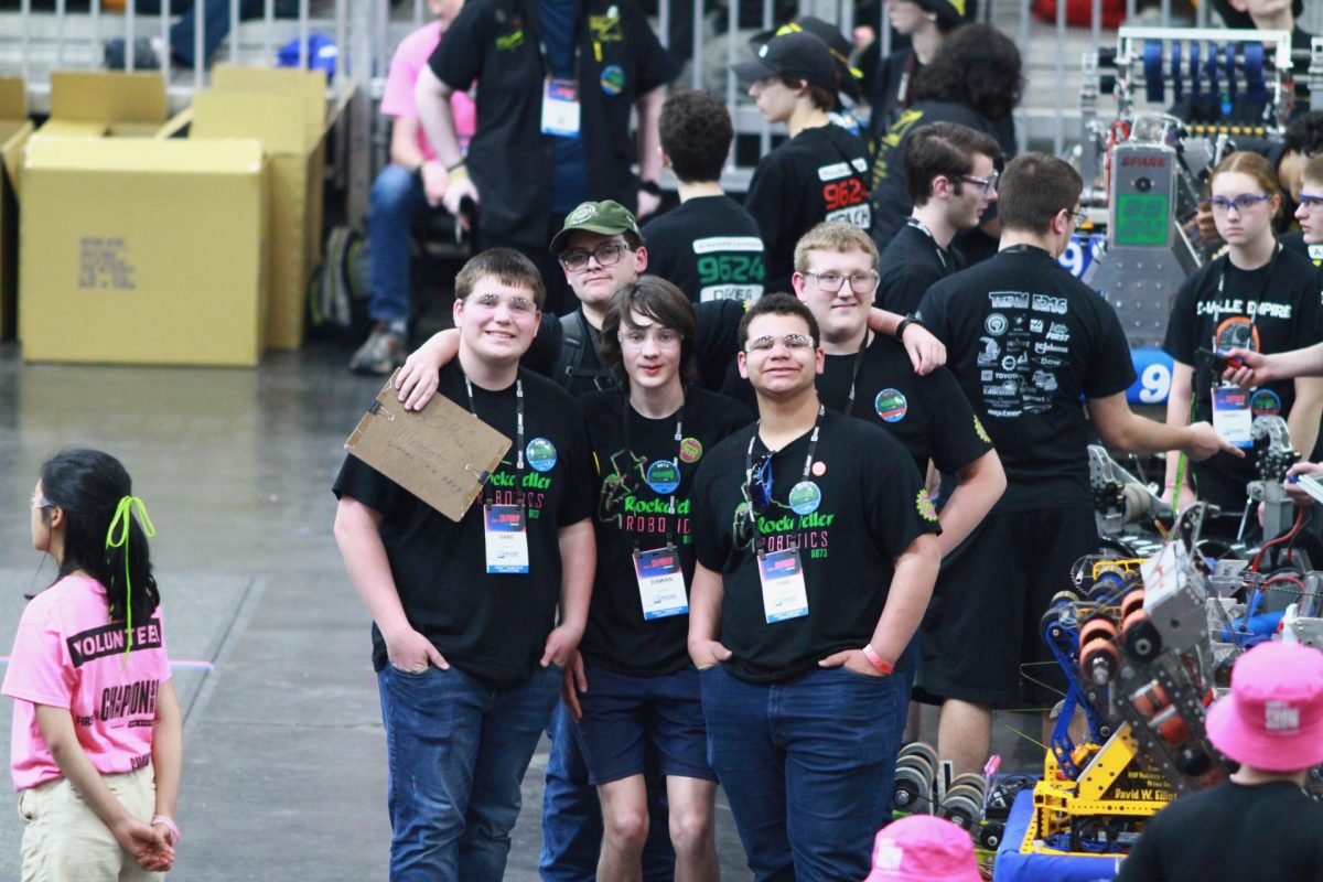 Robotics team members at the world competition. 