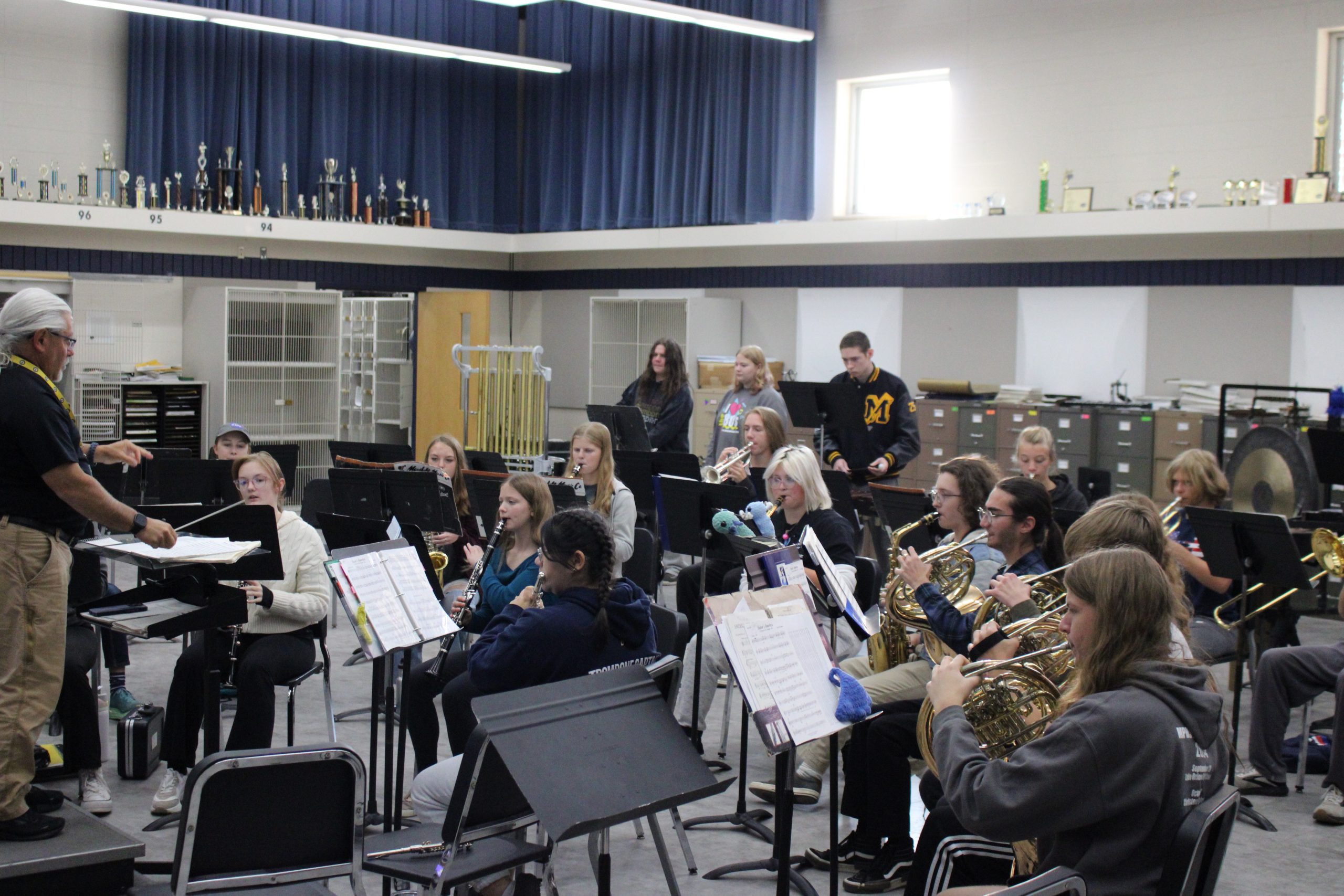 The band in the middle of playing the piece "Foster's America" by Robert Gillingham.