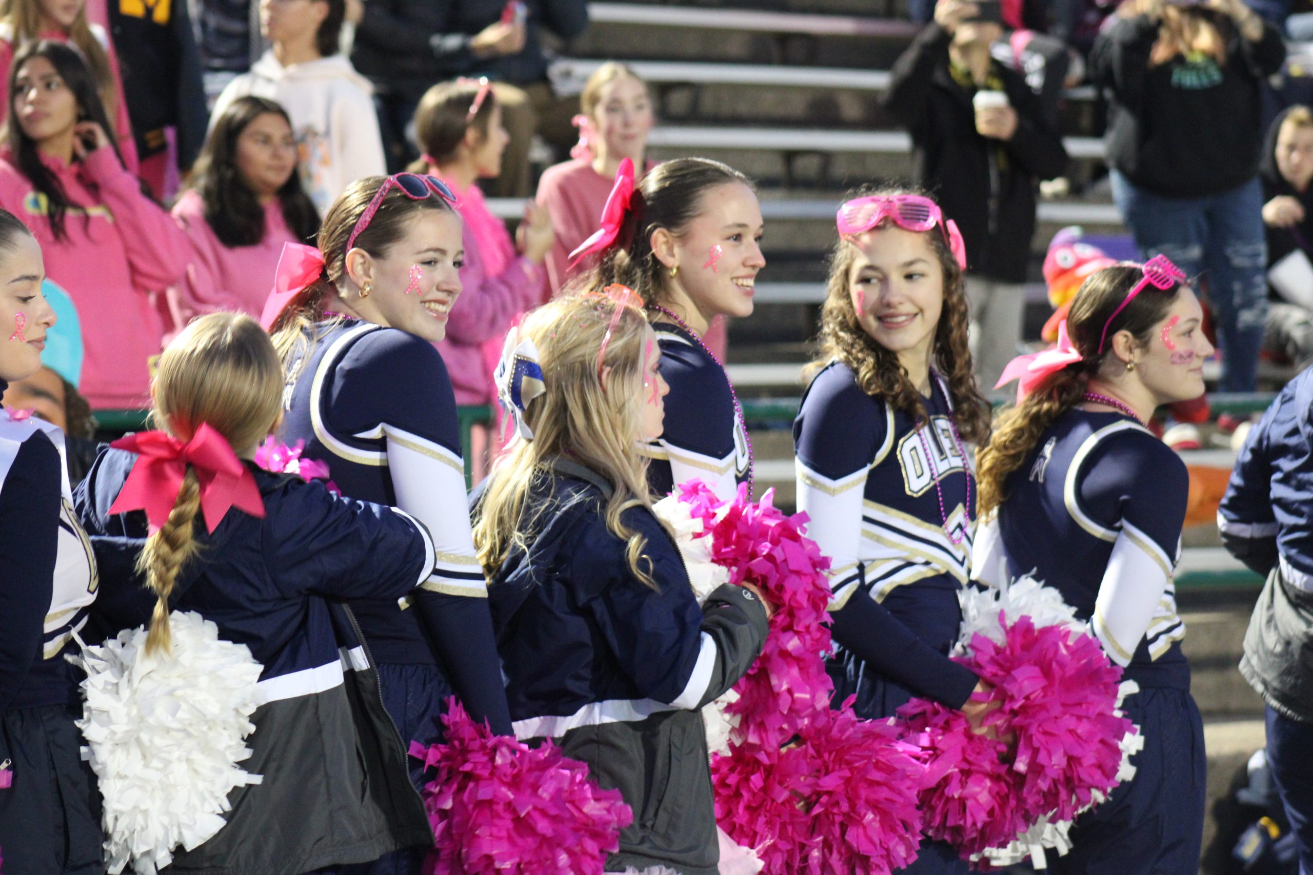 MPHS Varsity Cheer sporting Pink in support 