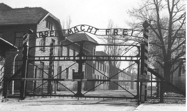 The main gate of Auschwitz concentration camp. The picture was taken after the war. 
